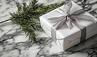 Neatly wrapped white gift with a silver ribbon, positioned on a marble table next to a sprig of fir. AI generated [IBR125000270]