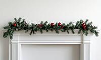 White mantle decorated with a simple pine garland and a few red baubles. AI generated [IBR125000303]