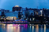 View across Xuan Huong Lake toward the city center of Da Lat, Dalat, Central Highlands, Vietnam [IBR125002301]