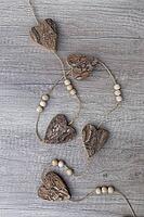 Wooden hearts, strung on a cord, Kempen, Viersen District, North Rhine-Westphalia, Germany [IBR125007578]