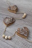 Wooden hearts, strung on a cord, Kempen, Viersen District, North Rhine-Westphalia, Germany [IBR125007585]