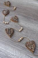 Wooden hearts, strung on a cord, Kempen, Viersen District, North Rhine-Westphalia, Germany [IBR125007614]