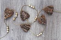 Wooden hearts, strung on a cord, Kempen, Viersen District, North Rhine-Westphalia, Germany [IBR125007615]