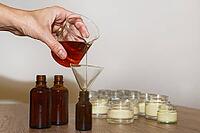 Homemade skincare oil Johanneskraut is bottled, Kempen, Viersen District, North Rhine-Westphalia, Germany [IBR125007623]