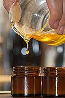 Homemade cream is filled into small jars, Kempen, Viersen district, North Rhine-Westphalia, Germany [IBR125007640]