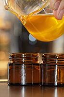 Homemade cream is filled into small jars, Kempen, Viersen district, North Rhine-Westphalia, Germany [IBR125007661]