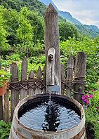 Beautifully landscaped cottage garden with a wooden fence, show garden, Merano, South Tyrol, Italy [IBR125030438]