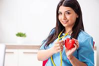 Young beautiful female doctor working in the clinic [IBR125053241]