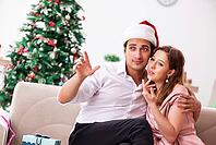 Man making marriage proposal at christmas day [IBR125053254]