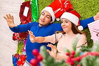 Pregnant wife celevrating christmas with husband [IBR125053268]
