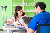 Female patient visiting male doctor in medical concept [IBR125062181]