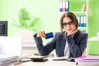 Female financial manager working in the office [IBR125062208]