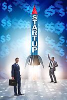 Start-up concept with rocket and businessman [IBR125062212]