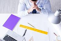 Engineer working on new project drawings [IBR125062238]