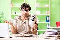 Young student in expensive tuition concept [IBR125062245]
