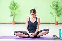 Woman doing exercises at home [IBR125062252]