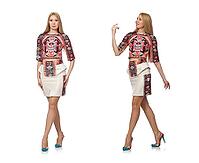 Pretty model in clothes with carpet prints isolated on white [IBR125075721]