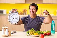 Young man in dieting and healthy eating concept [IBR125075739]