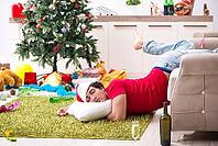 Young man drunk at home after christmas party [IBR125075756]