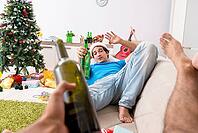 Young man drunk at home after christmas party [IBR125075757]