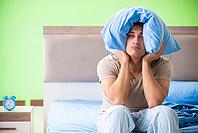 Man suffering from sleeping disorder and insomnia [IBR125075782]