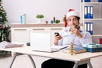 Telesales operator during christmas sale on the phone [IBR125075798]
