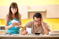 Young family struggling with personal finance [IBR125075805]