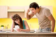 Young family struggling with personal finance [IBR125075806]