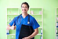 Young doctor working in the hospital [IBR125094349]