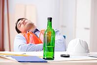Drunk engineer working in the workshop [IBR125094350]