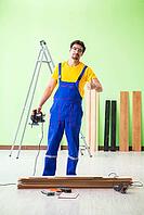 Professional contractor laying flooring at home [IBR125094361]