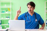 Doctor student explaining heart problems [IBR125094365]