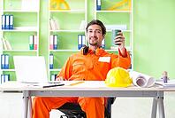 Construction supervisor planning new project in office [IBR125094380]
