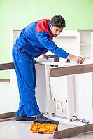 Repair contractor repairing broken furniture at home [IBR125094387]