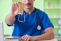 Young doctor working in the hospital [IBR125094399]