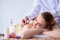 Woman during massage session in spa [IBR125094421]