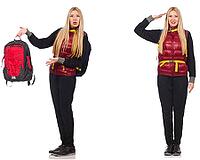 Young woman with backpack isolated on white [IBR125117968]