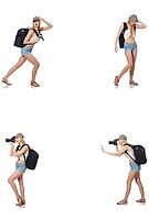 Beautiful woman in shorts with backpack and camera [IBR125117979]