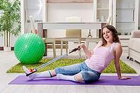 Young beautiful woman doing exercises at home [IBR125141686]