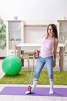 Young beautiful woman doing exercises at home [IBR125141687]