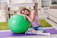 Young beautiful woman doing exercises at home [IBR125141689]