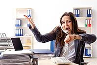 Young female employee unhappy with excessive work [IBR125141718]