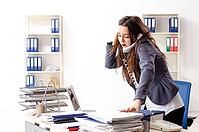 Young female employee unhappy with excessive work [IBR125141728]