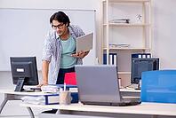 It specialist working in the office [IBR125141773]