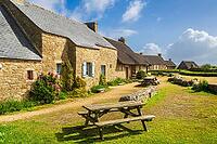 Meneham is a historic former fishing village near Kerlouan in northern Finistère, Brittany, France. Traditional stone houses are set among massive granite boulders close to the Atlantic coast, creating a distinctive coastal settlement that reflects the ma [IBR125163373]