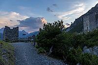 Torri di Fraele, historic watchtowers, with clouds at dusk, Valdidentro, Sondrio, Italy [IBR125163395]