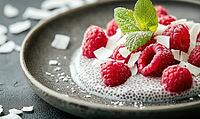 Yogurt and honey-topped chia pudding with raspberries and coconut on a rustic dark plate. AI generated [IBR125167405]