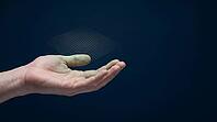 Human hand open palm floating against dark navy background, contactless biometric fingerprint scanning laser grid projected above fingertips, next-generation fingerprint capture technology concept, studio shot, AI generated [IBR125167456]
