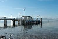 Jetty with a view of the Alps, moated castle am Lake Constance, Bavaria, Germany [IBR125173459]