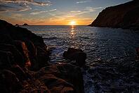 Evening, sunset at sea, The Brisons rock formation in the background, Cot Valley Beach, Porth Nanven, coast, St Just in Penwith, Cornwall, England, Great Britain, Great Britain [IBR125177979]